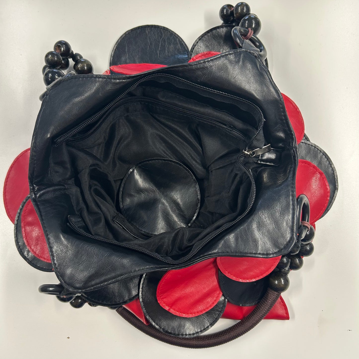 black and red faux leather disc beaded shoulder bag