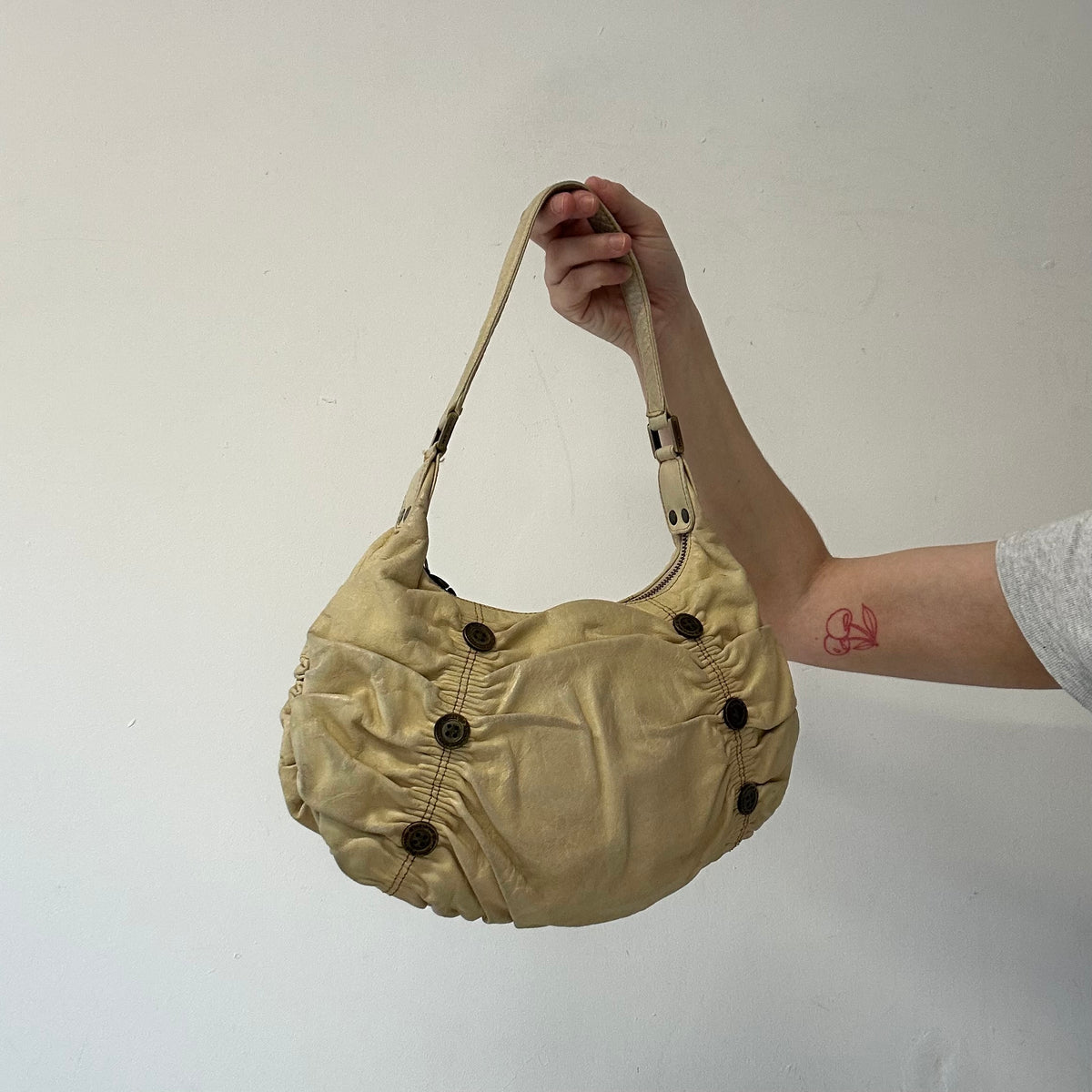 cream tanned ruched button shoulder bag