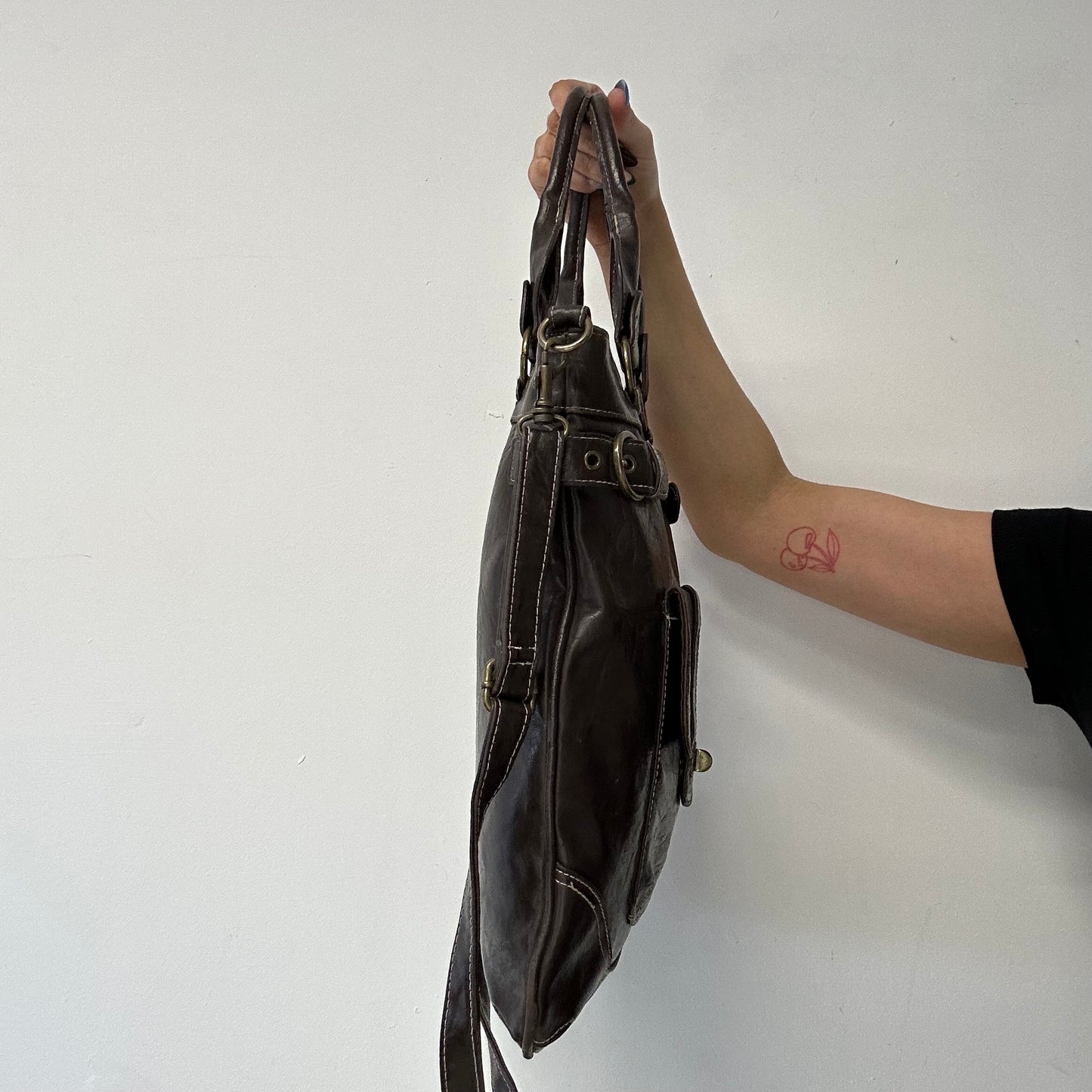 brown leather buckle shoulder bag