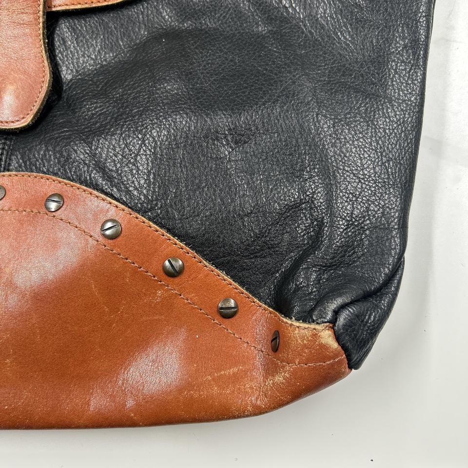 black and brown studded western shoulder bag