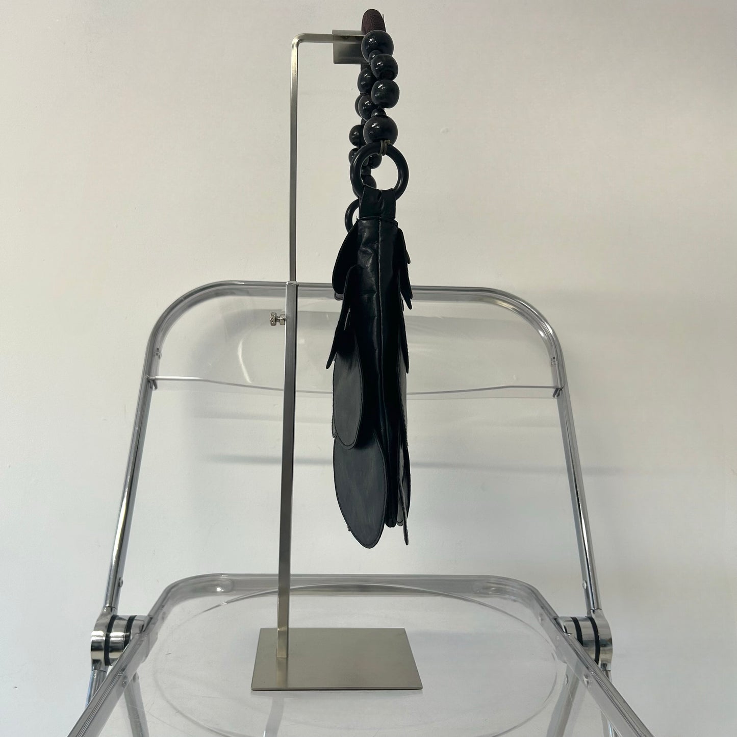 black faux leather disc beaded shoulder bag