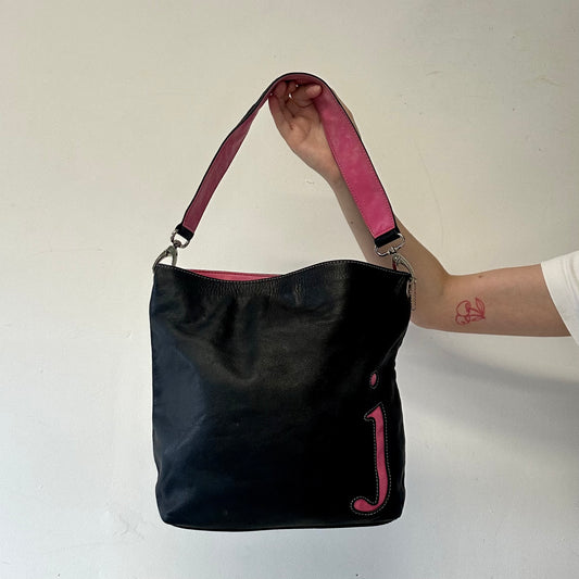 black and pink “J”  faux leather shoulder bag