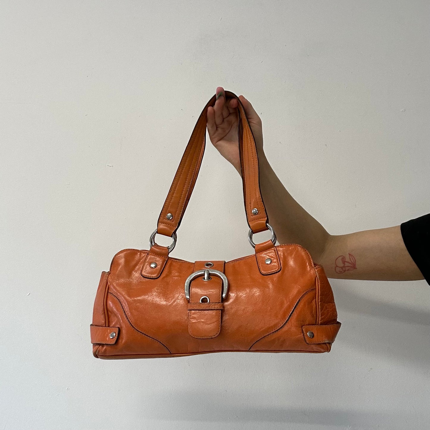 orange faux leather buckle shoulder bag