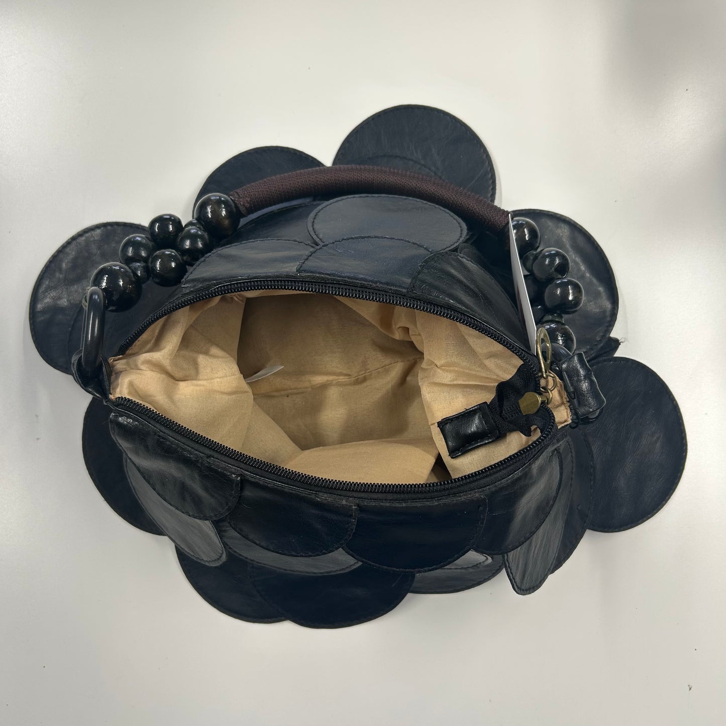 black faux leather disc beaded shoulder bag