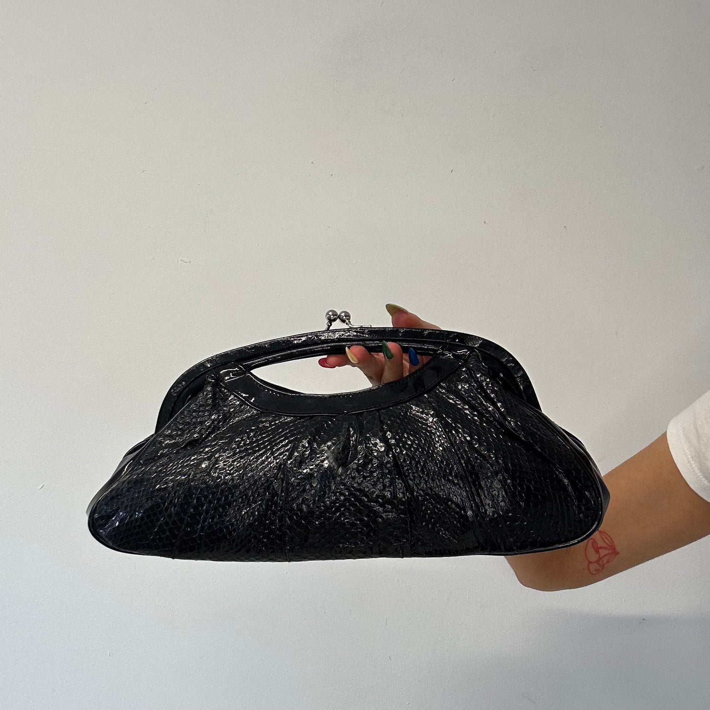 black faux leather croc effect clutch bag