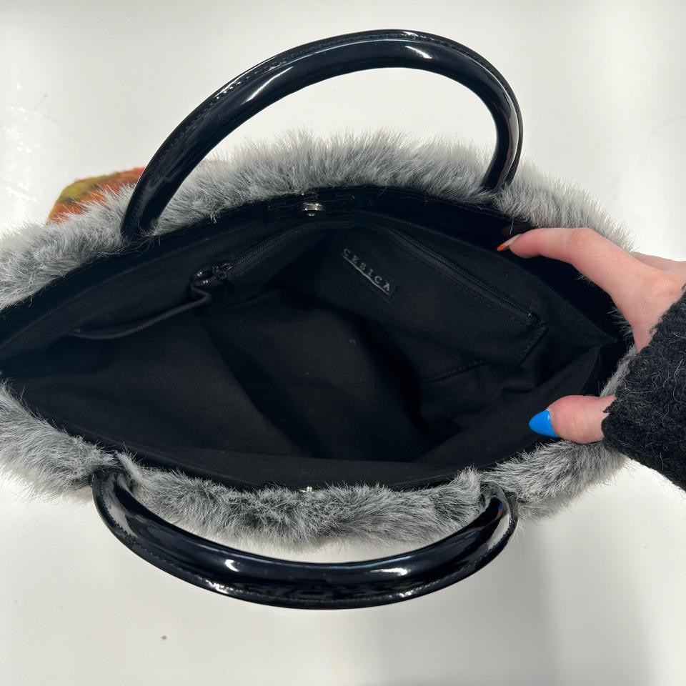 orange and pink plaid faux fur handbag