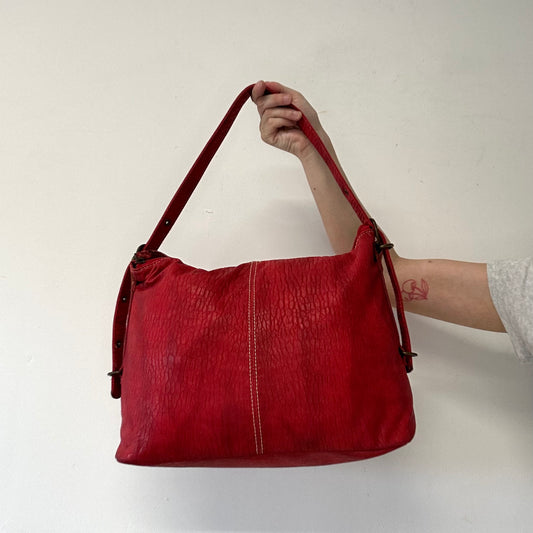 red faux leather shoulder bag