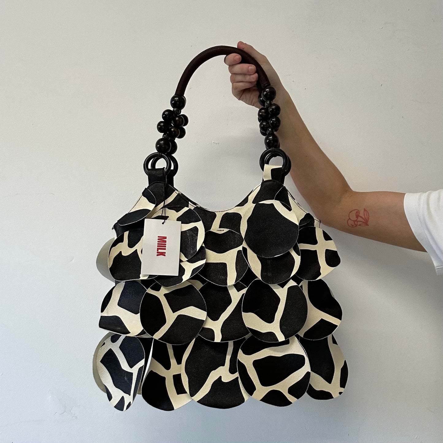 giraffe print faux leather disc beaded shoulder bag