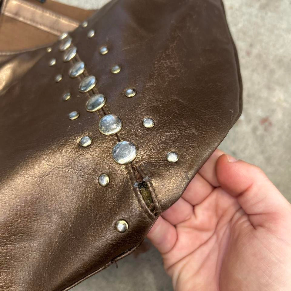 brown studded crescent faux leather shoulder bag