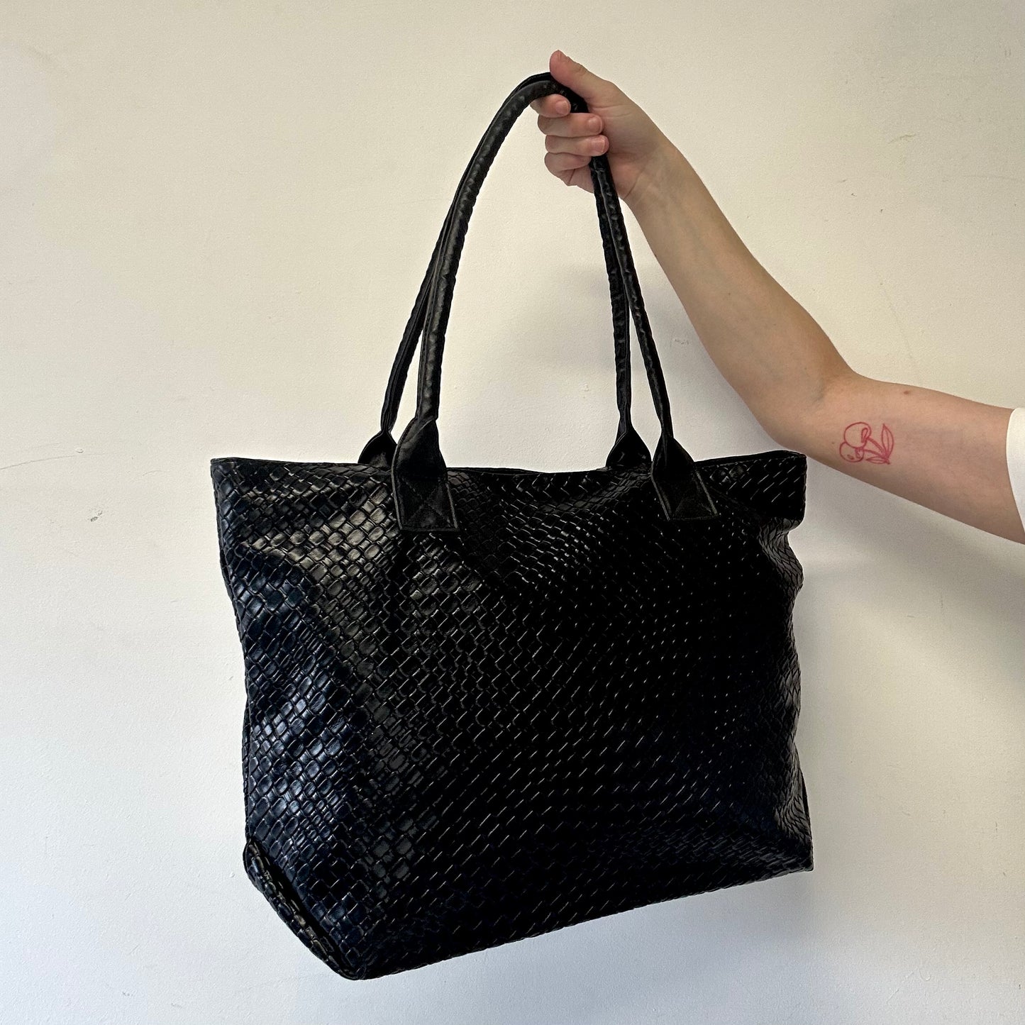 black faux leather woven effect shoulder bag