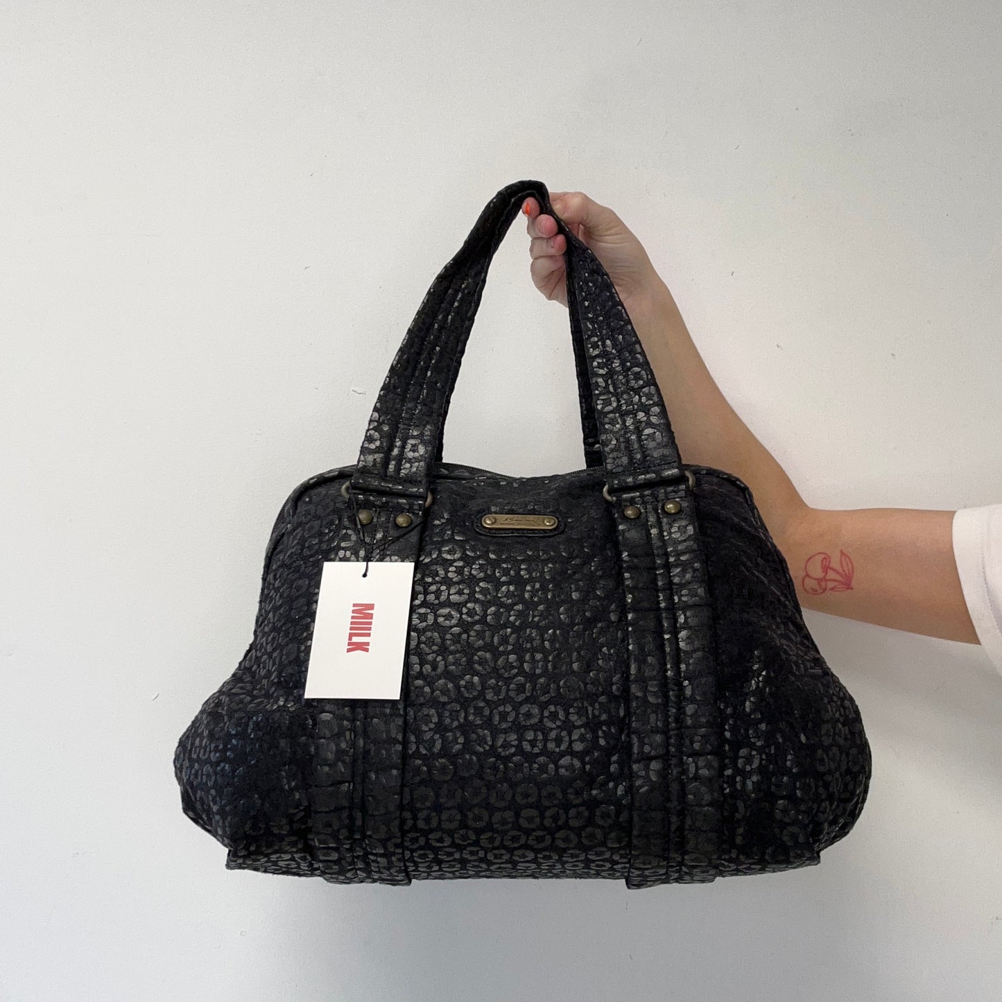 black leopard patterned shoulder bag