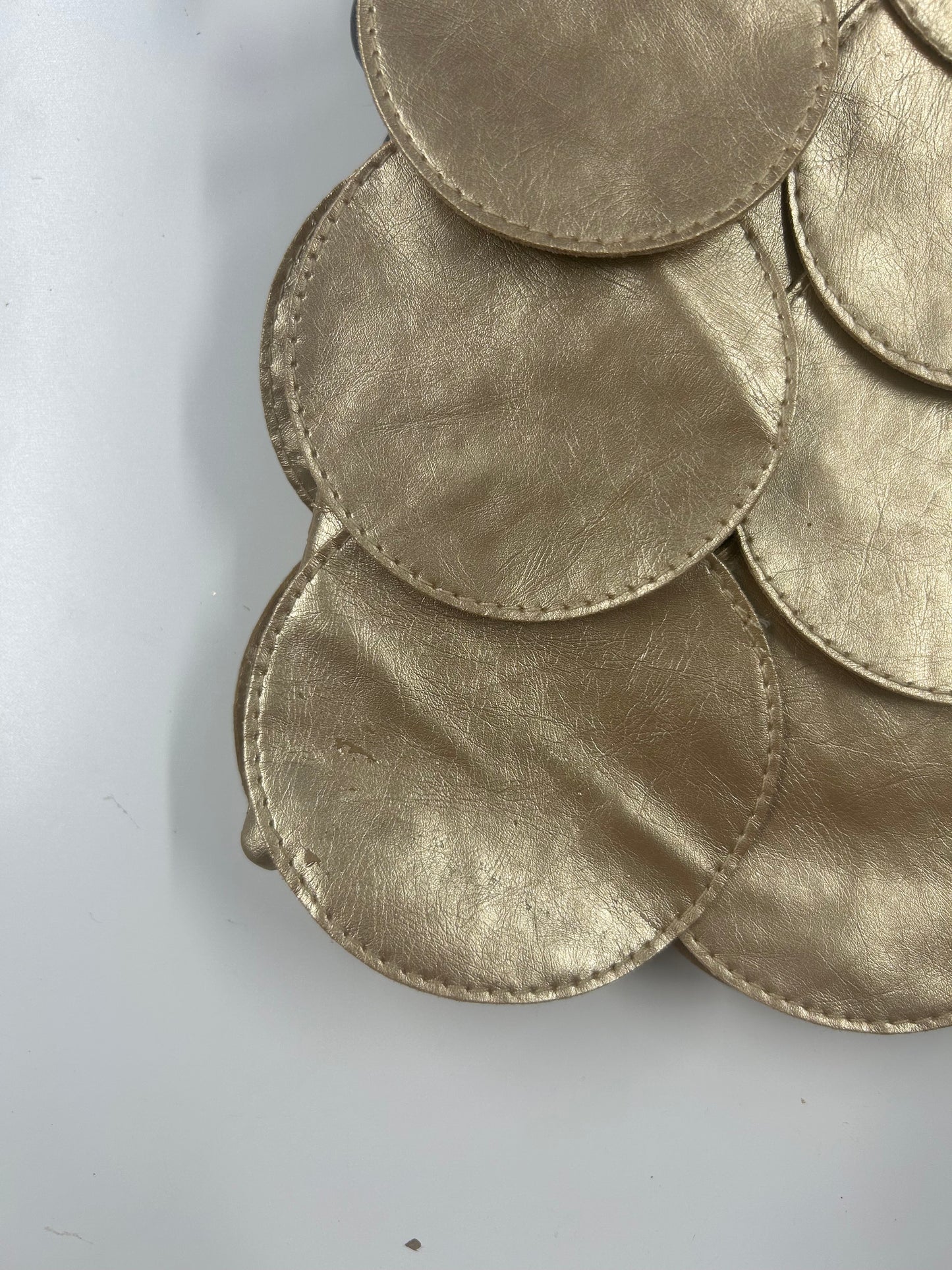 gold faux leather disc beaded shoulder bag
