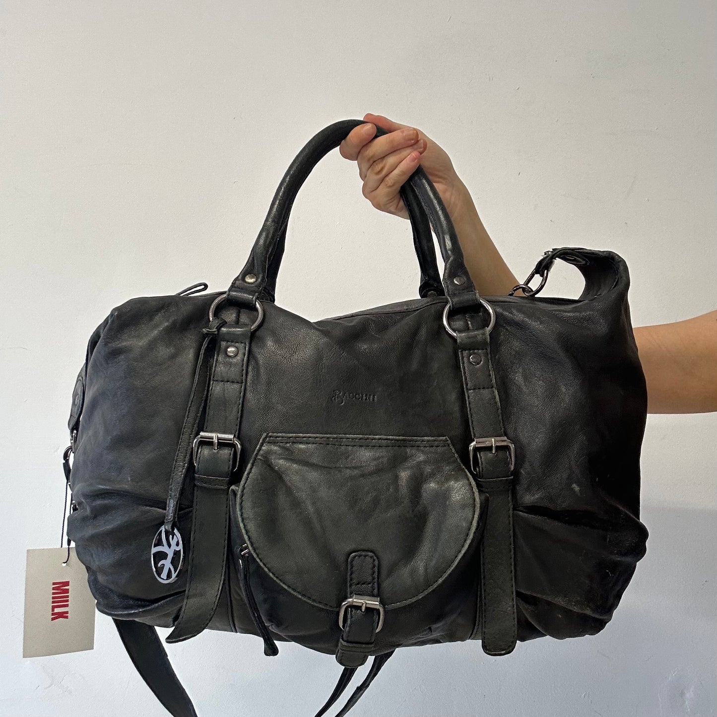 black genuine leather buckle luggage bag