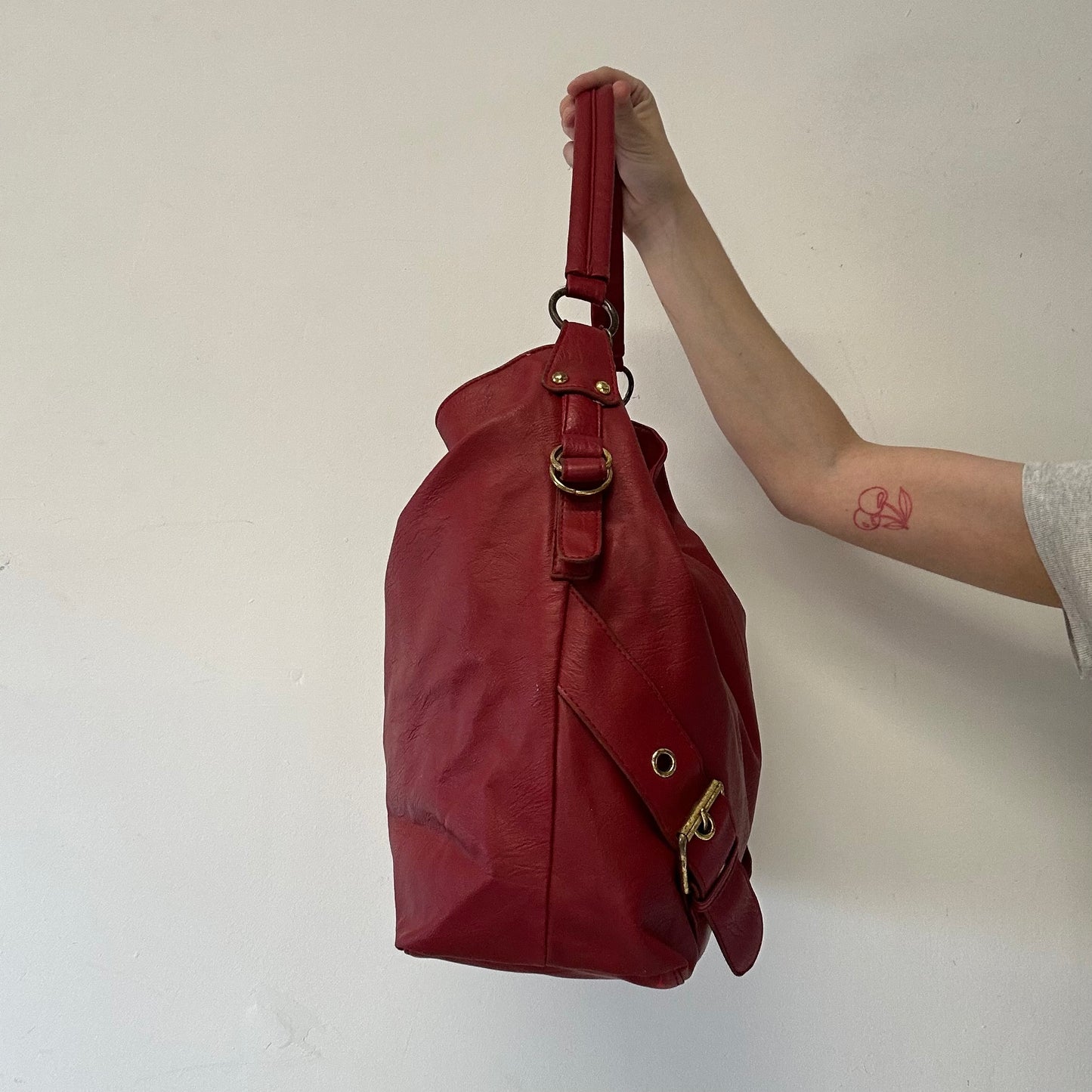 red double buckle faux leather shoulder bag
