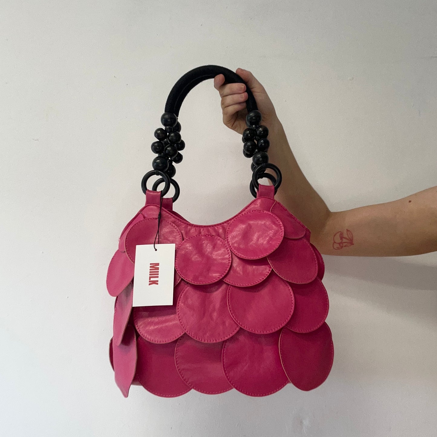 hot pink faux leather disc beaded shoulder bag