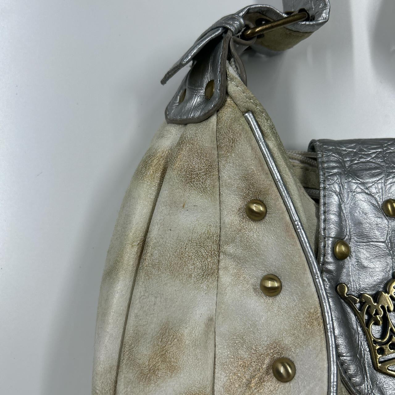 silver and gold studded crown faux leather shoulder bag