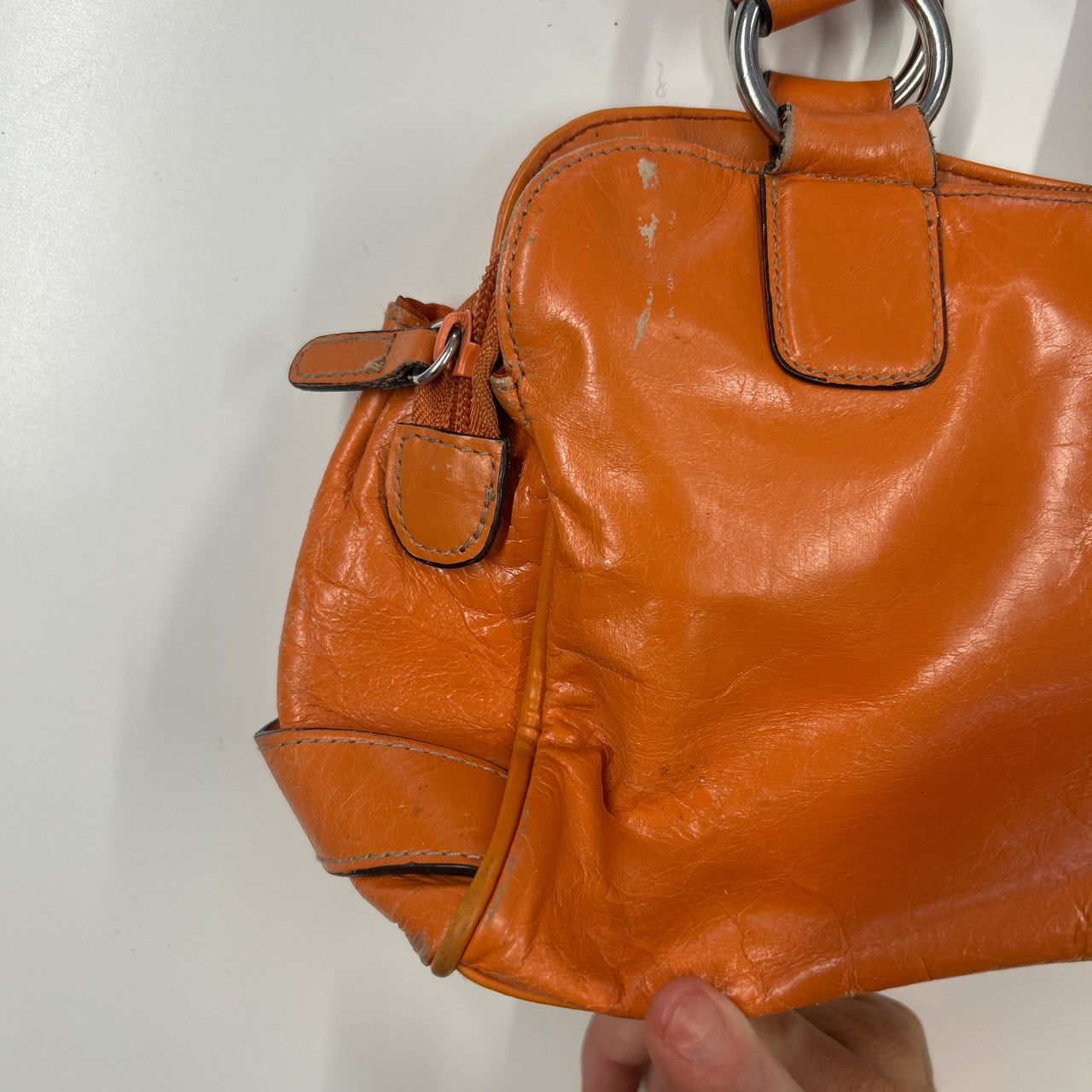orange faux leather buckle shoulder bag