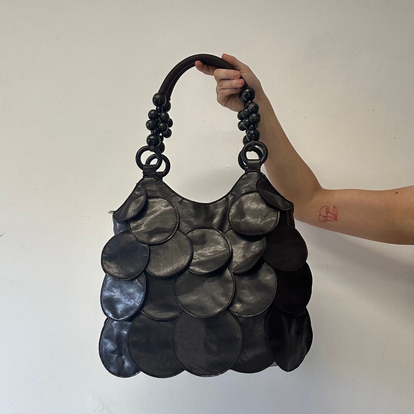 dark brown faux leather disc beaded shoulder bag