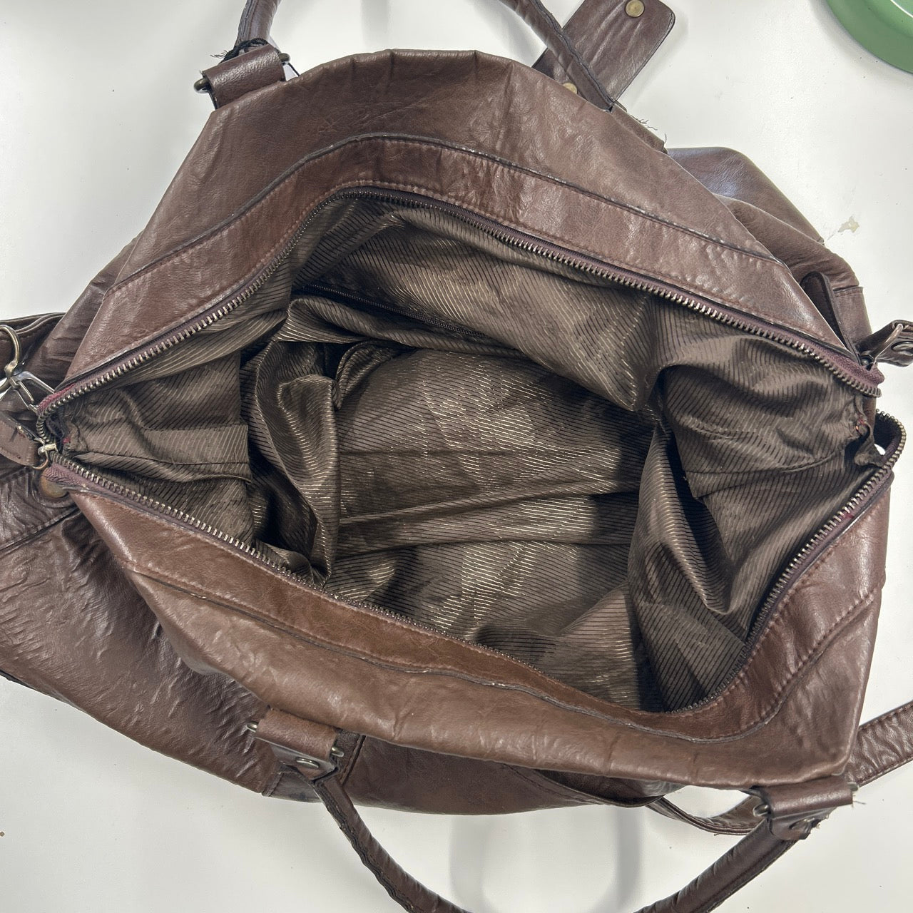 brown lightweight genuine leather shoulder duffle bag