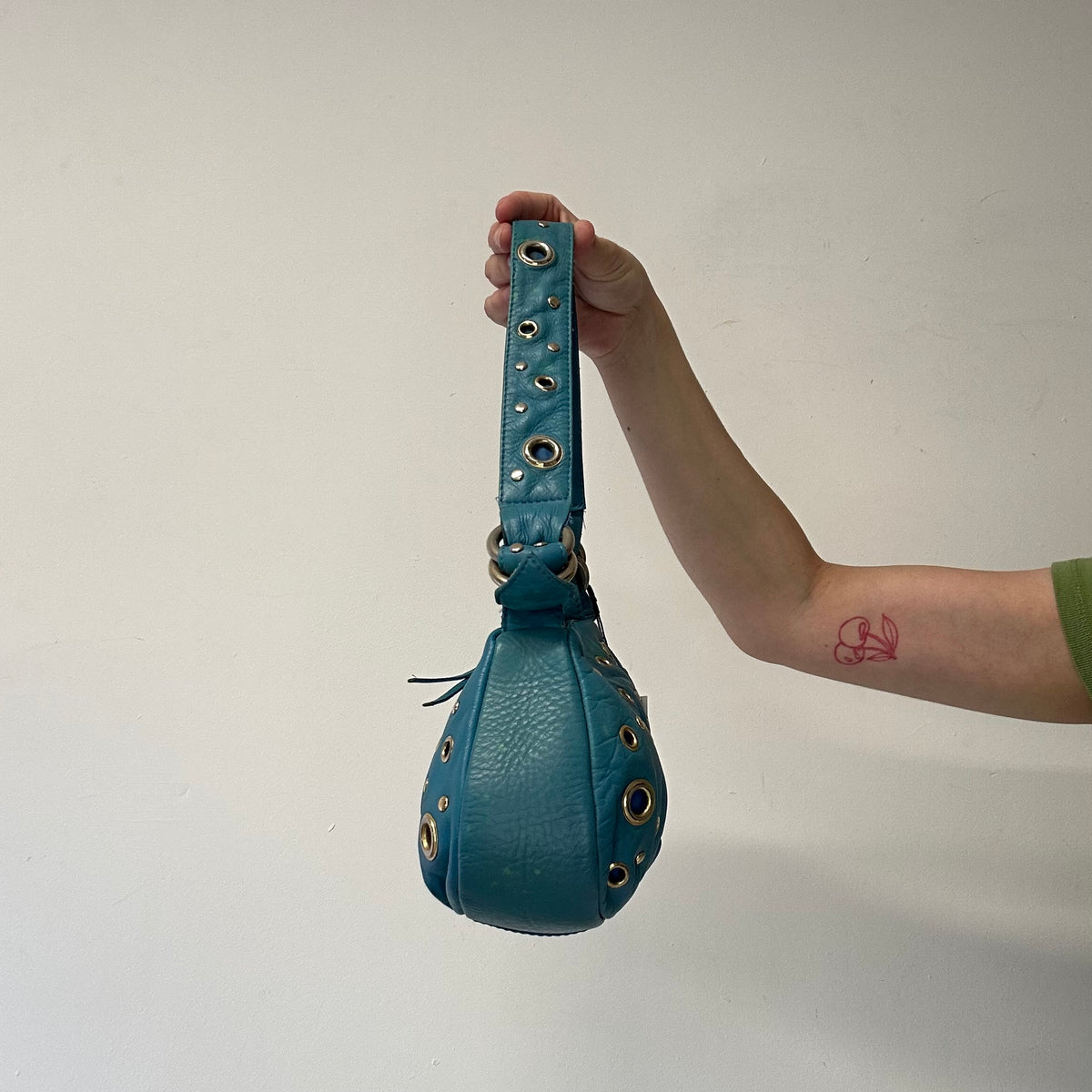 blue genuine leather eyelet shoulder bag