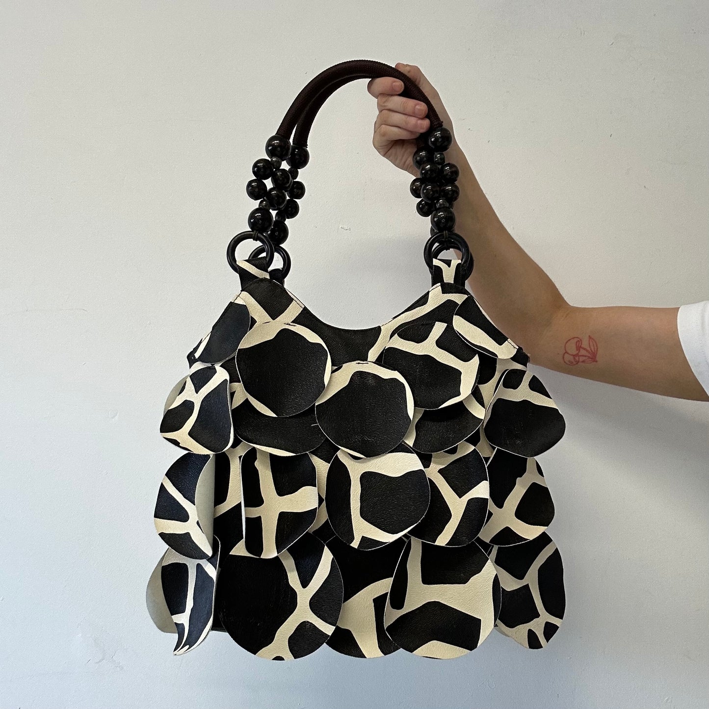 giraffe print faux leather disc beaded shoulder bag