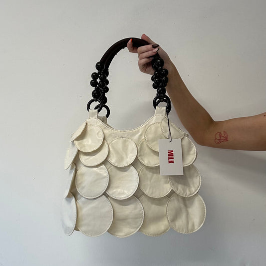 white faux leather disc beaded shoulder bag