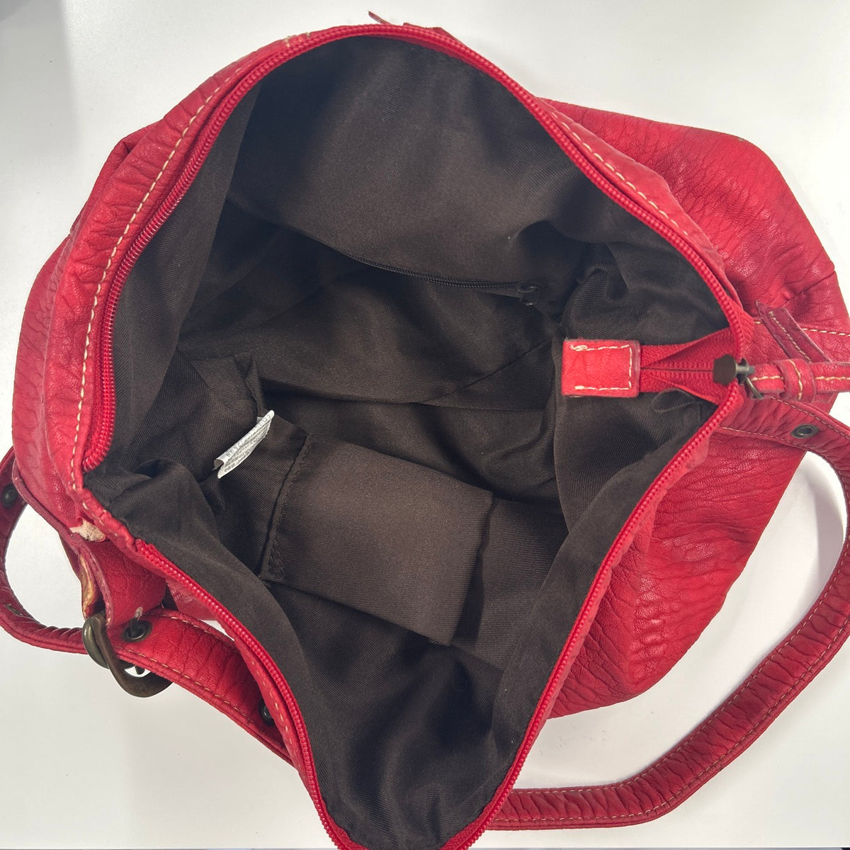 red faux leather shoulder bag