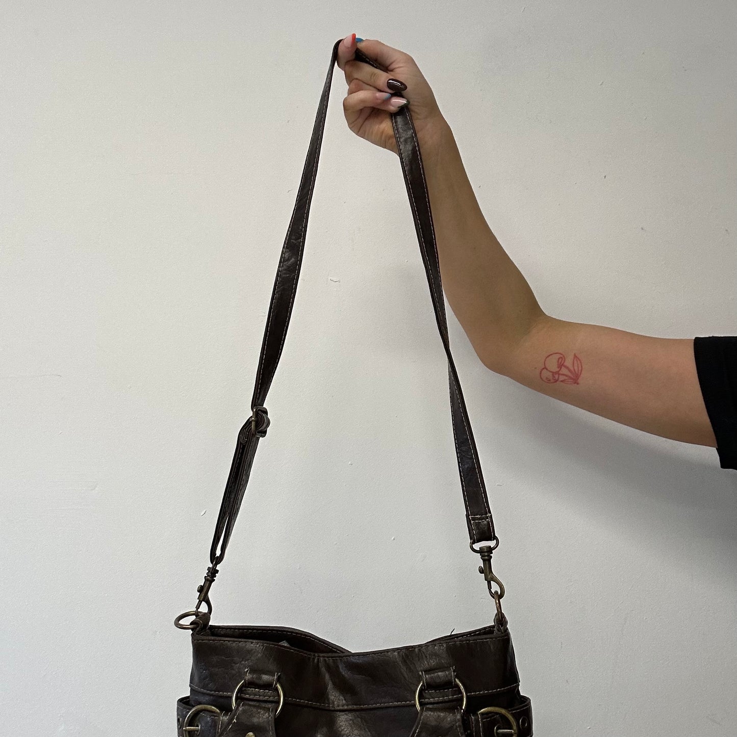 brown leather buckle shoulder bag