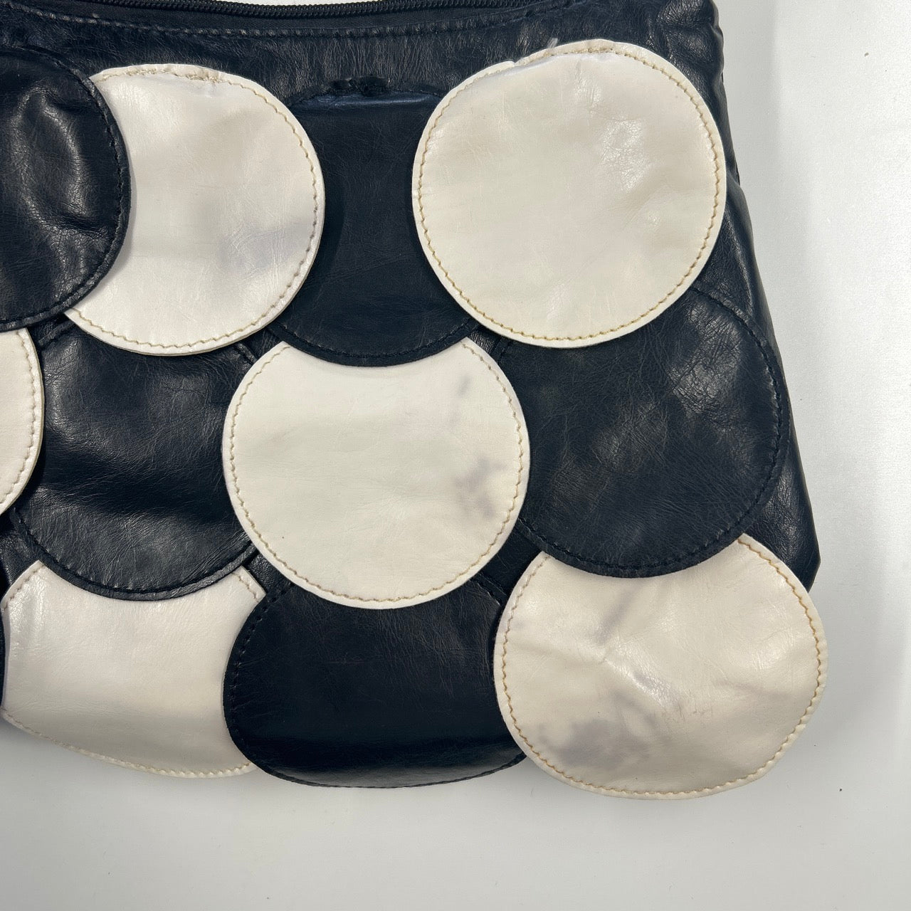 black and white faux leather disc beaded shoulder bag