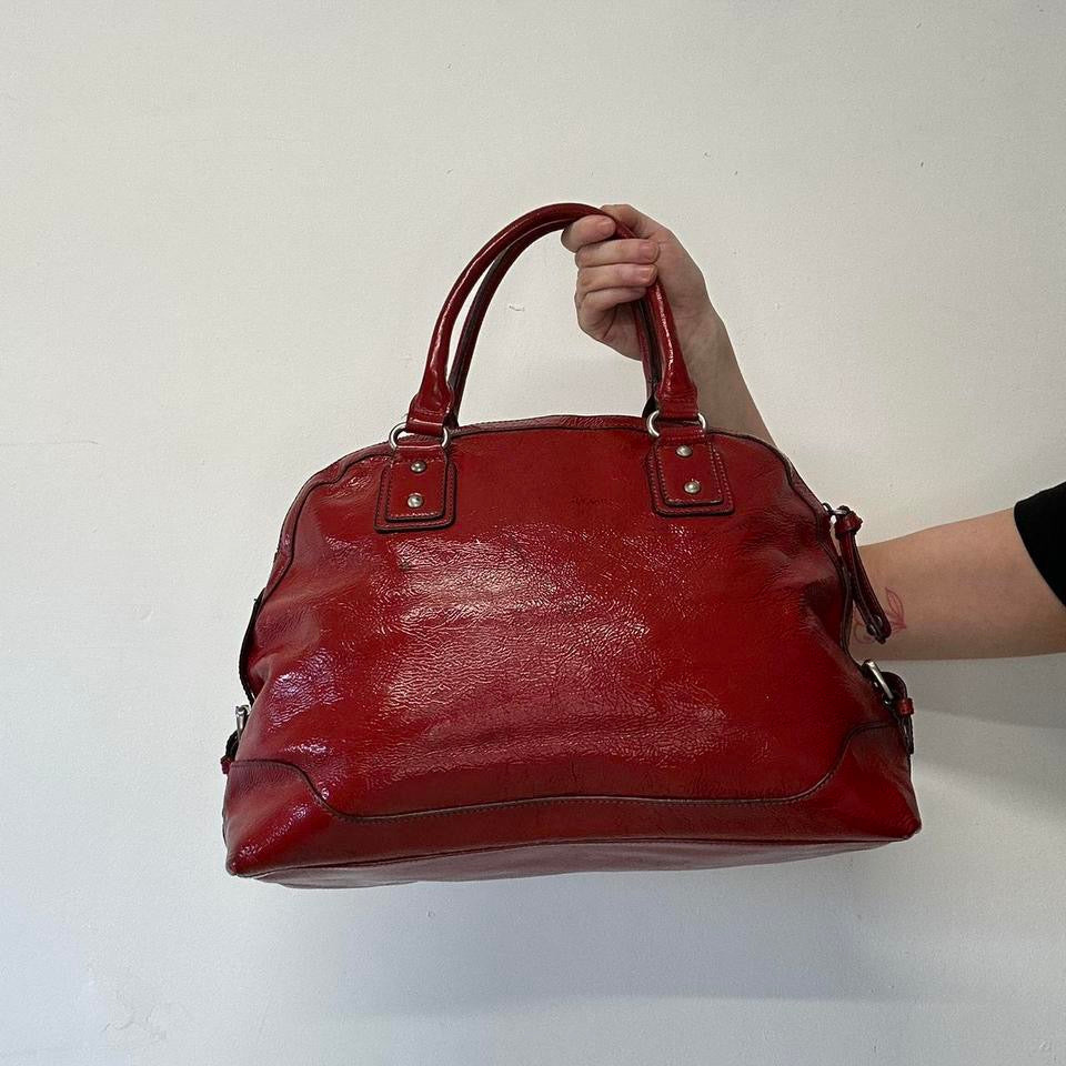 red faux leather padlock buckle shoulder bag