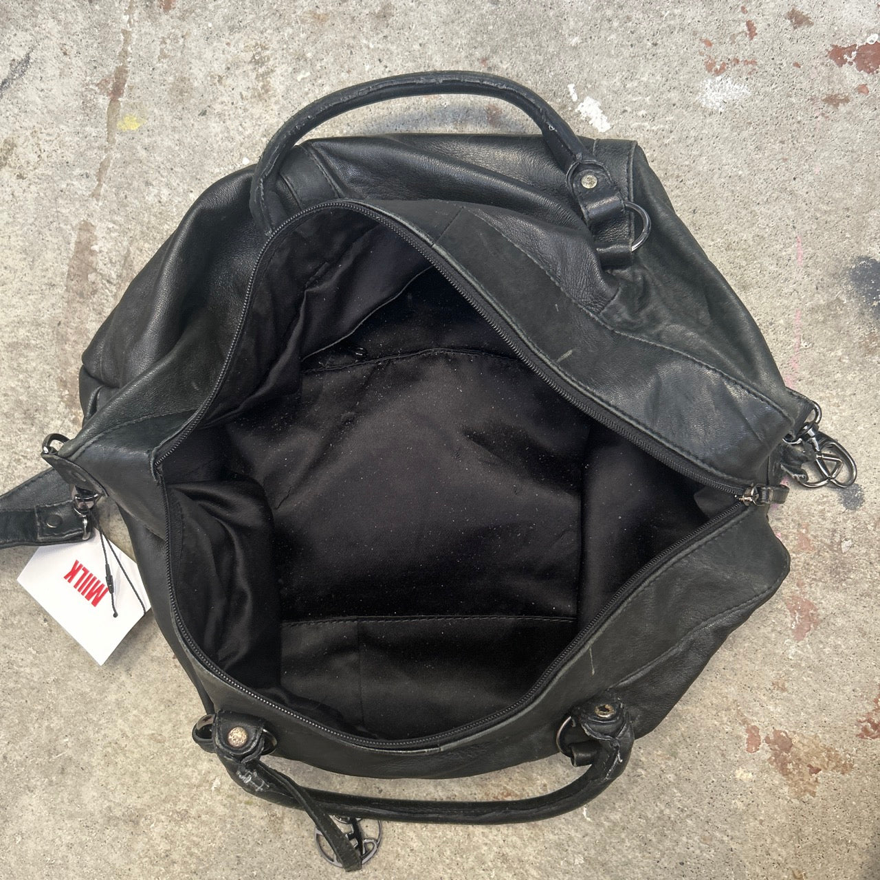 black genuine leather buckle luggage bag