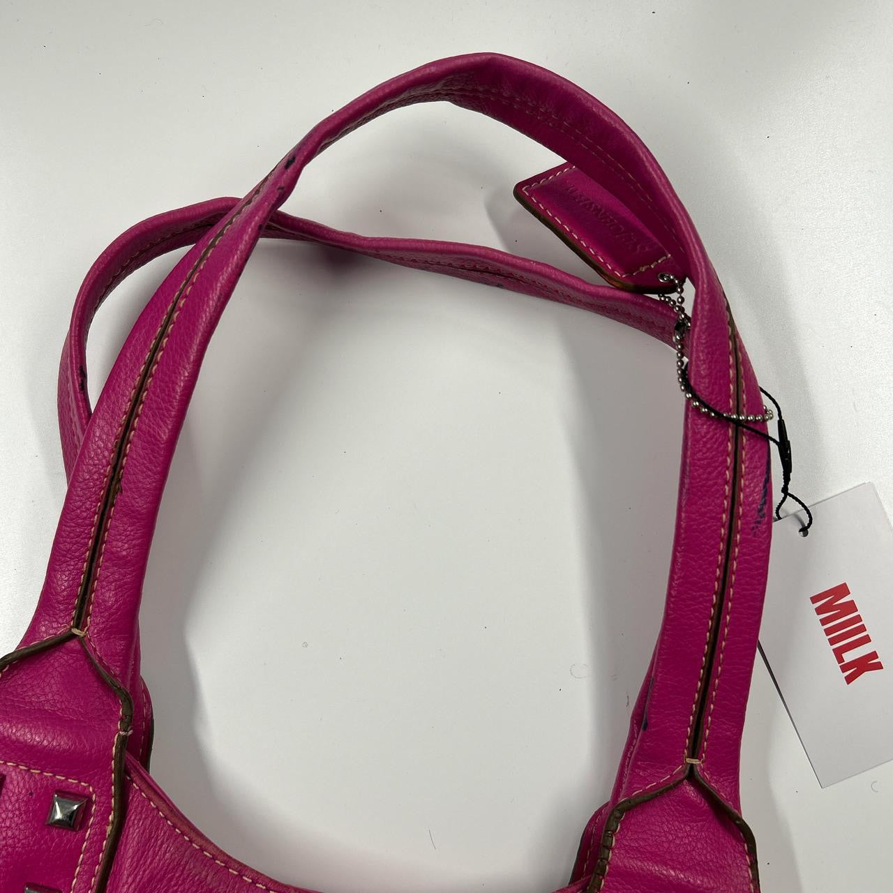 pink faux leather studded shoulder bag