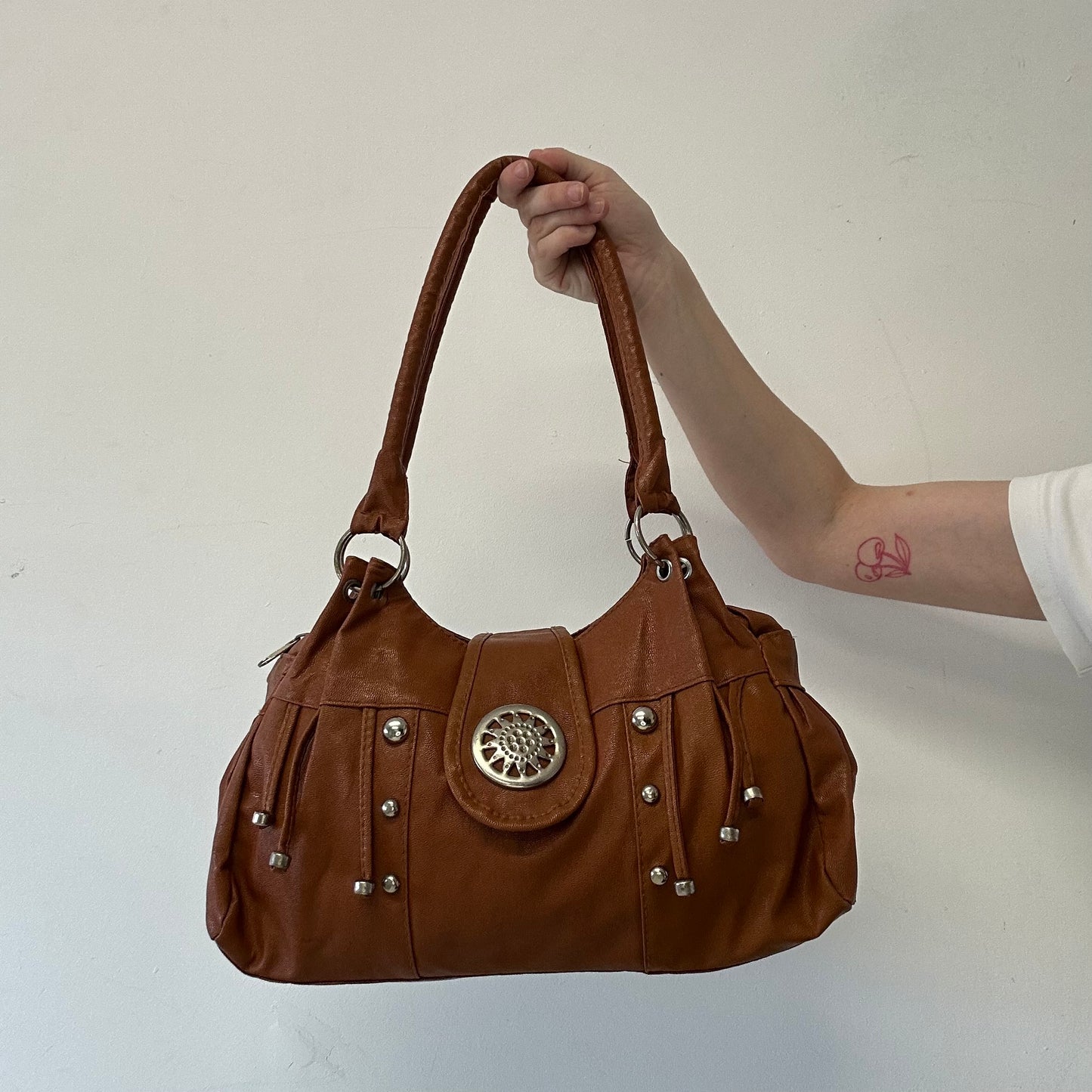 brown faux leather studded buckle shoulder bag