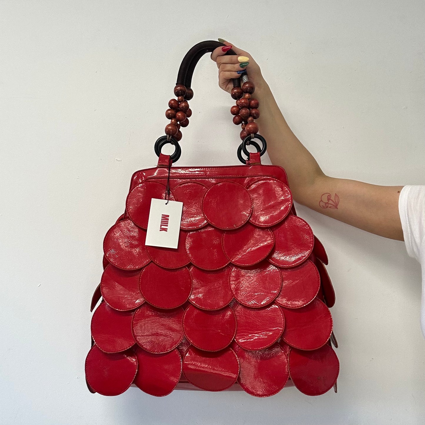 red faux leather disc beaded shoulder bag