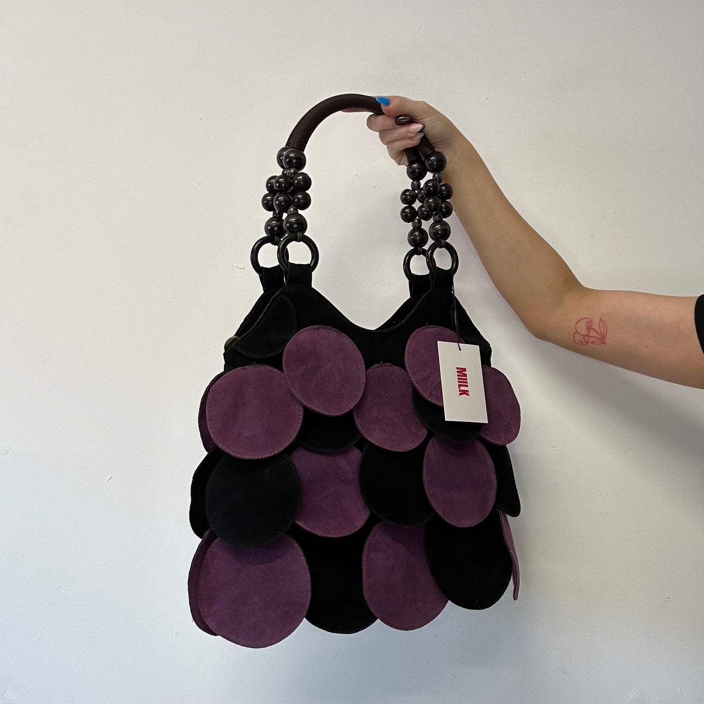 purple and black suede disc beaded shoulder bag