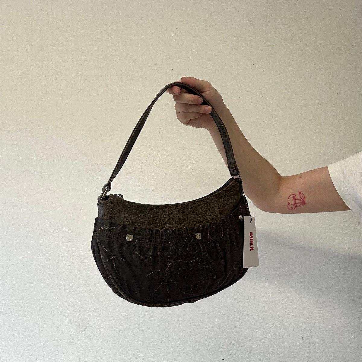 brown patterned faux leather shoulder bag