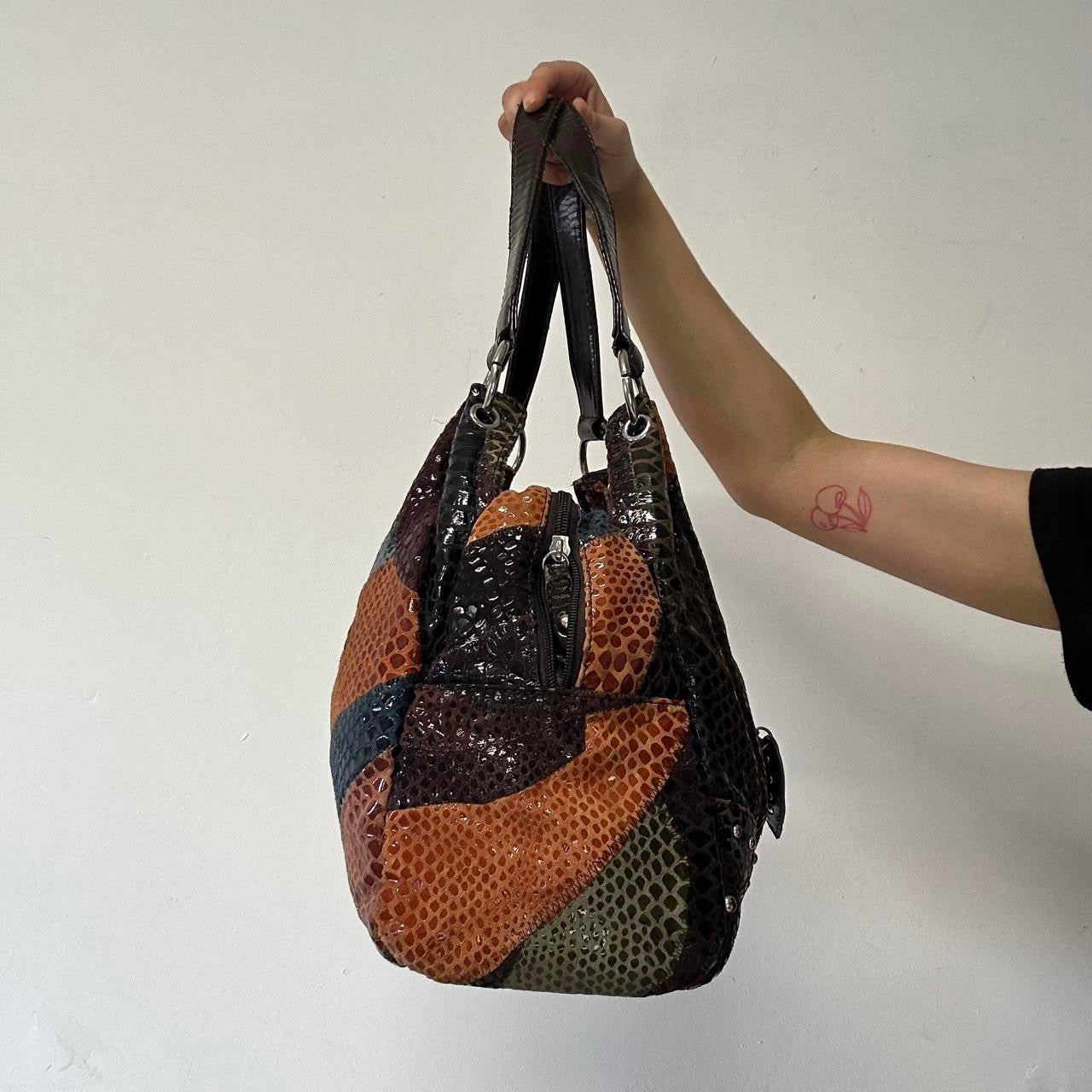 multicoloured patchworks studded faux leather shoulder bag