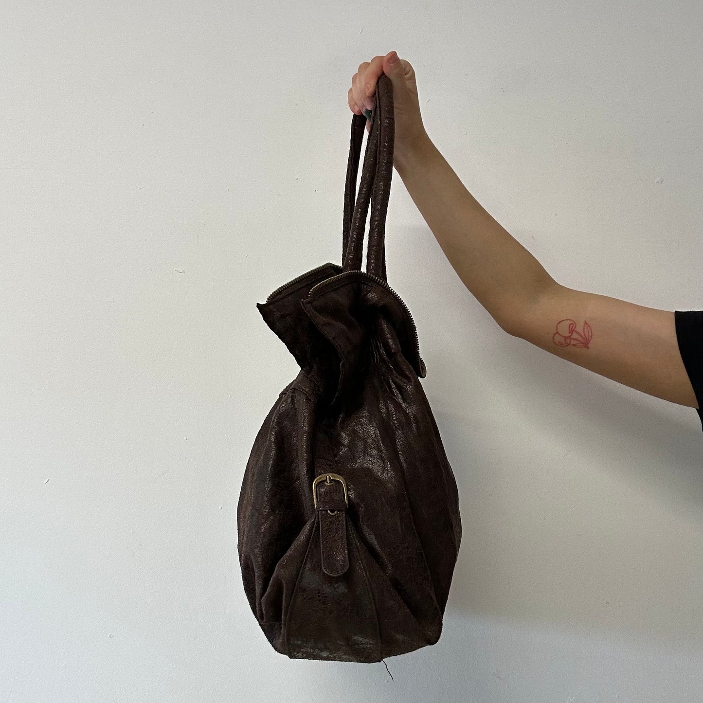 brown studded faux leather slouchy  shoulder bag