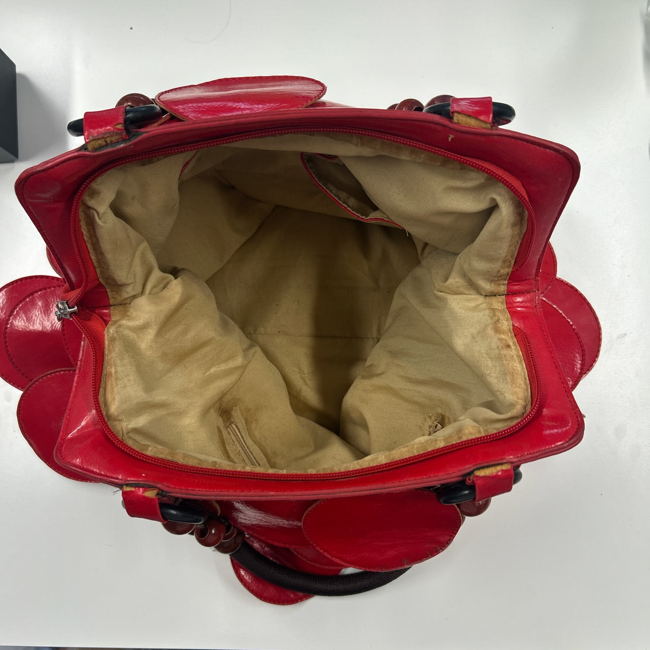 red faux leather disc beaded shoulder bag