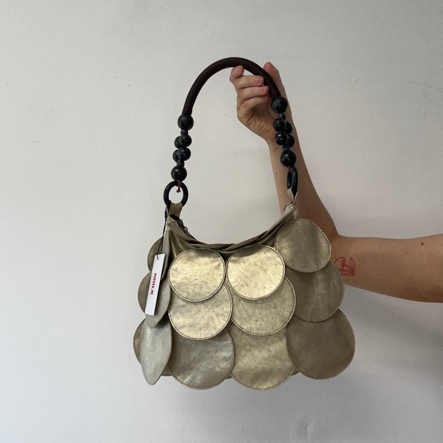 gold mini faux leather disc beaded shoulder bag