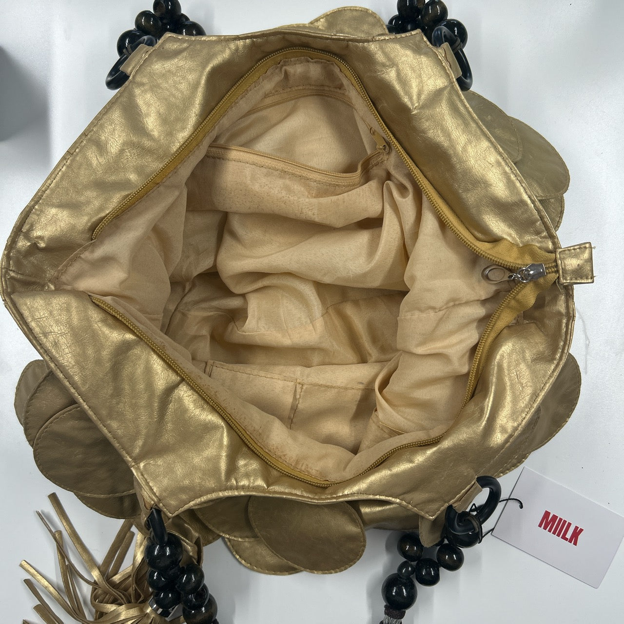 gold faux leather disc beaded shoulder bag
