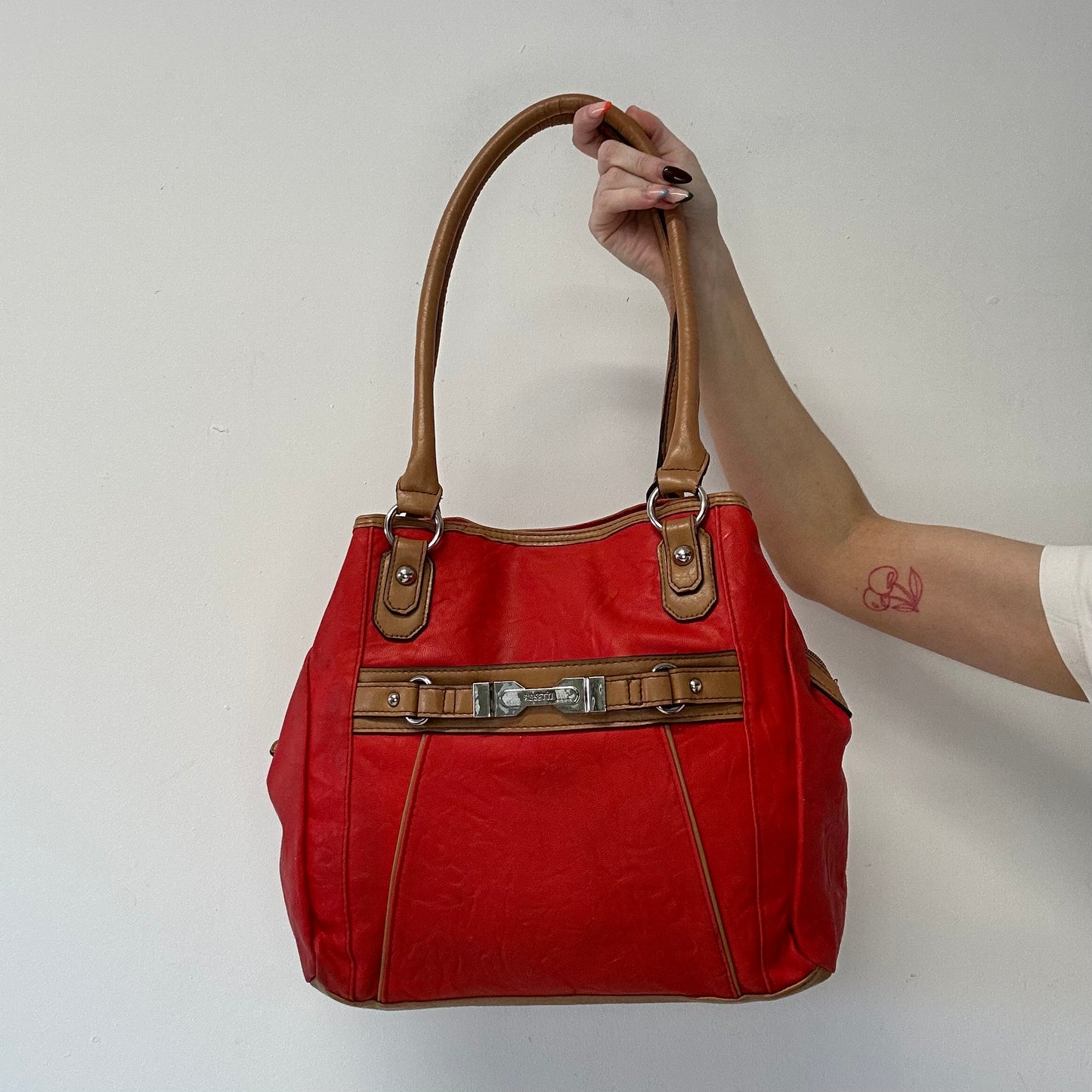 red and tanned faux leather shoulder bag