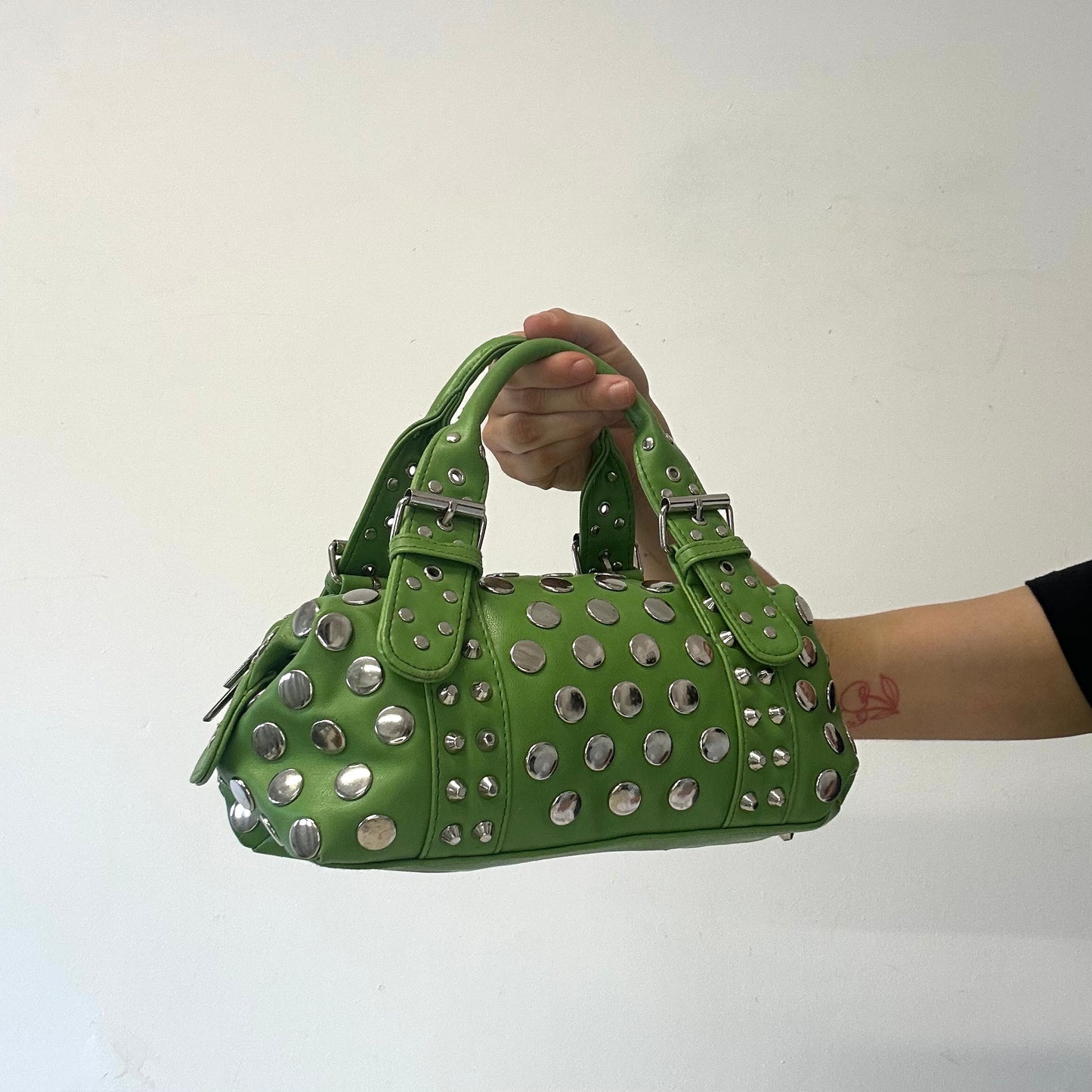 green studded double buckle mini hand bag