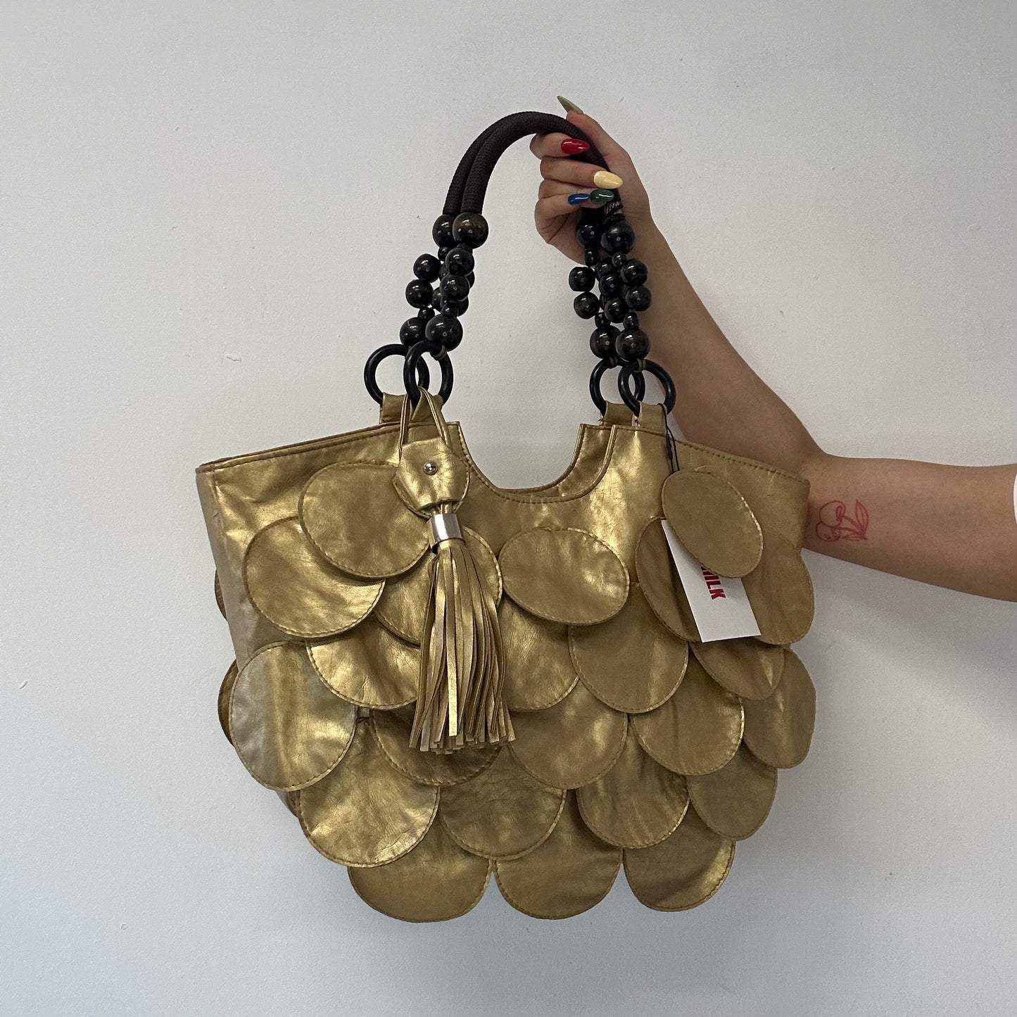 gold faux leather disc beaded shoulder bag