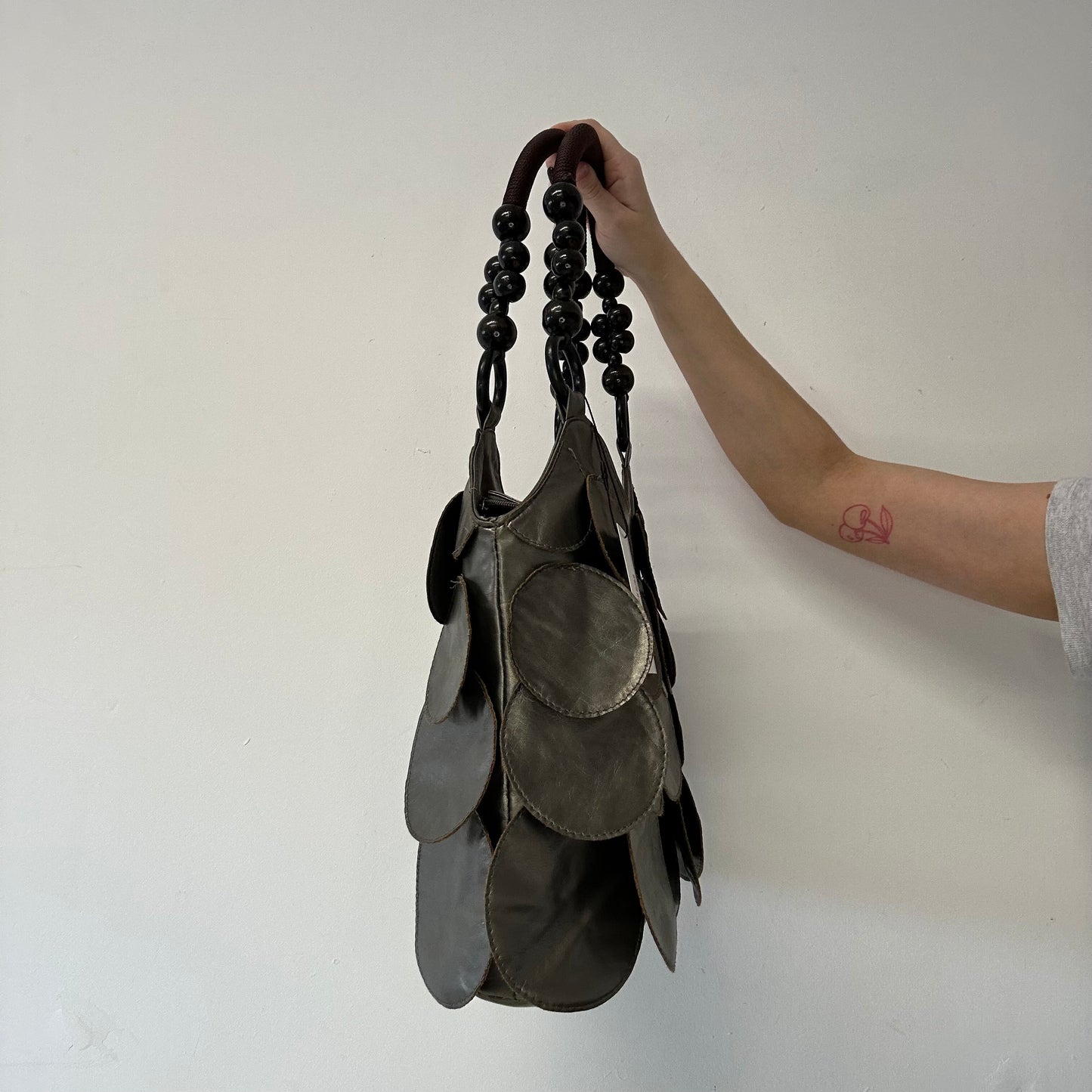 grey metallic faux leather disc beaded shoulder bag