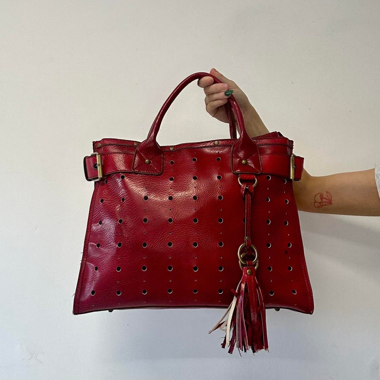 red faux leather studded buckle shoulder bag