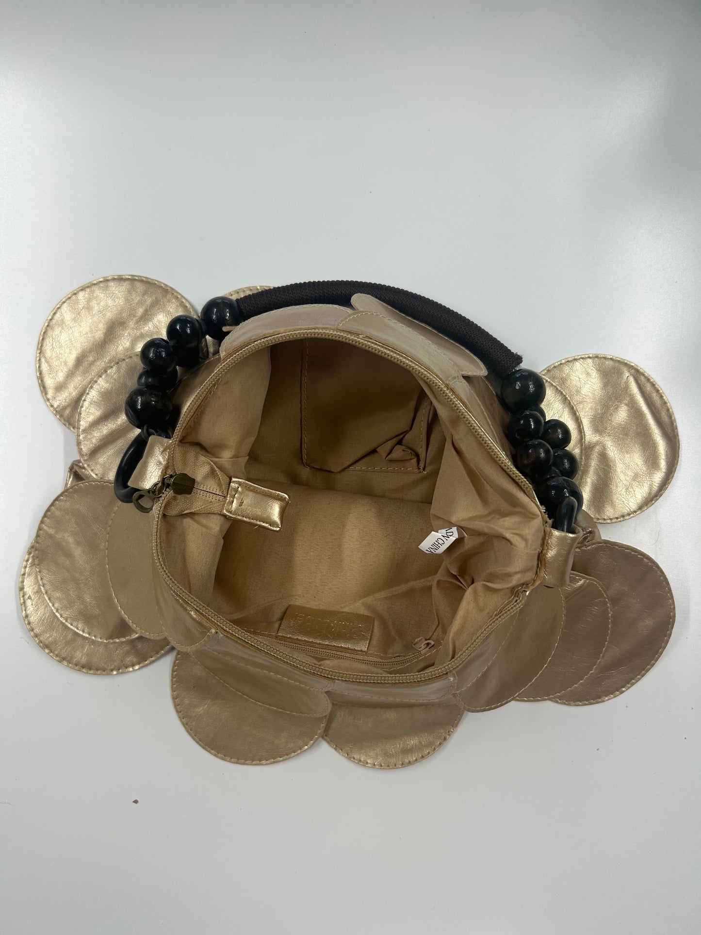 gold faux leather disc beaded shoulder bag
