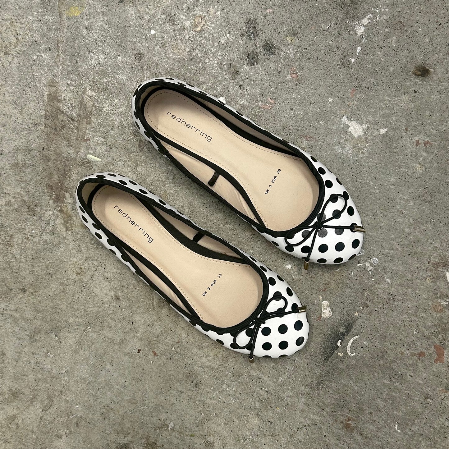 black and white polka dot ballet pumps
