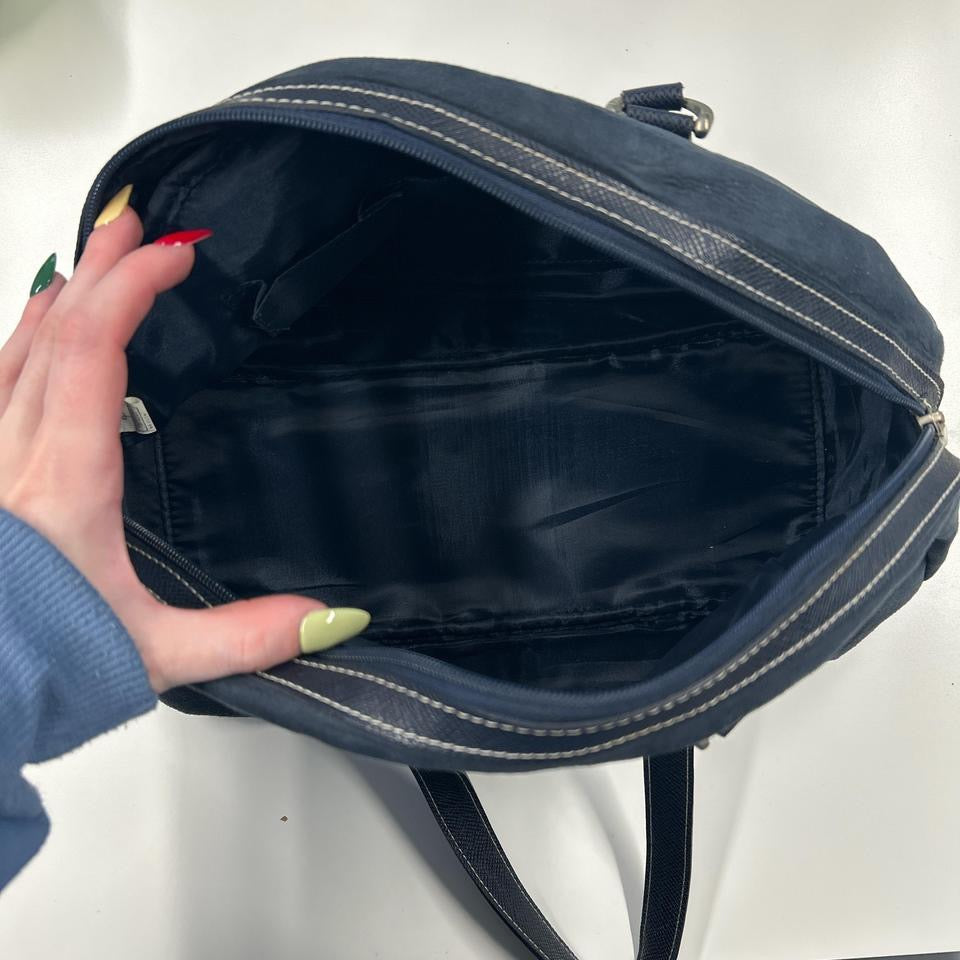 navy eyelet bowler shoulder bag