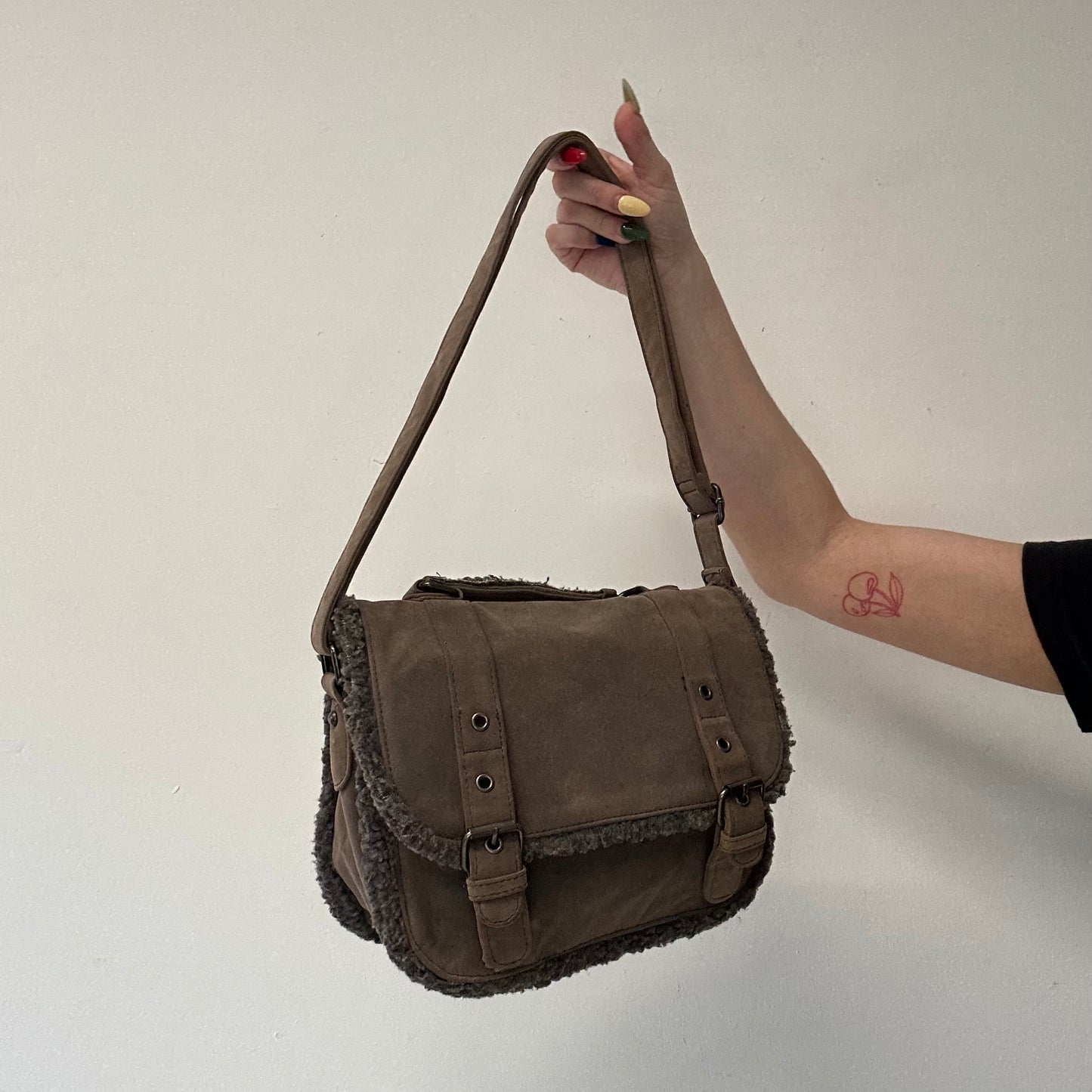 brown buckle shoulder bag with fleece trim